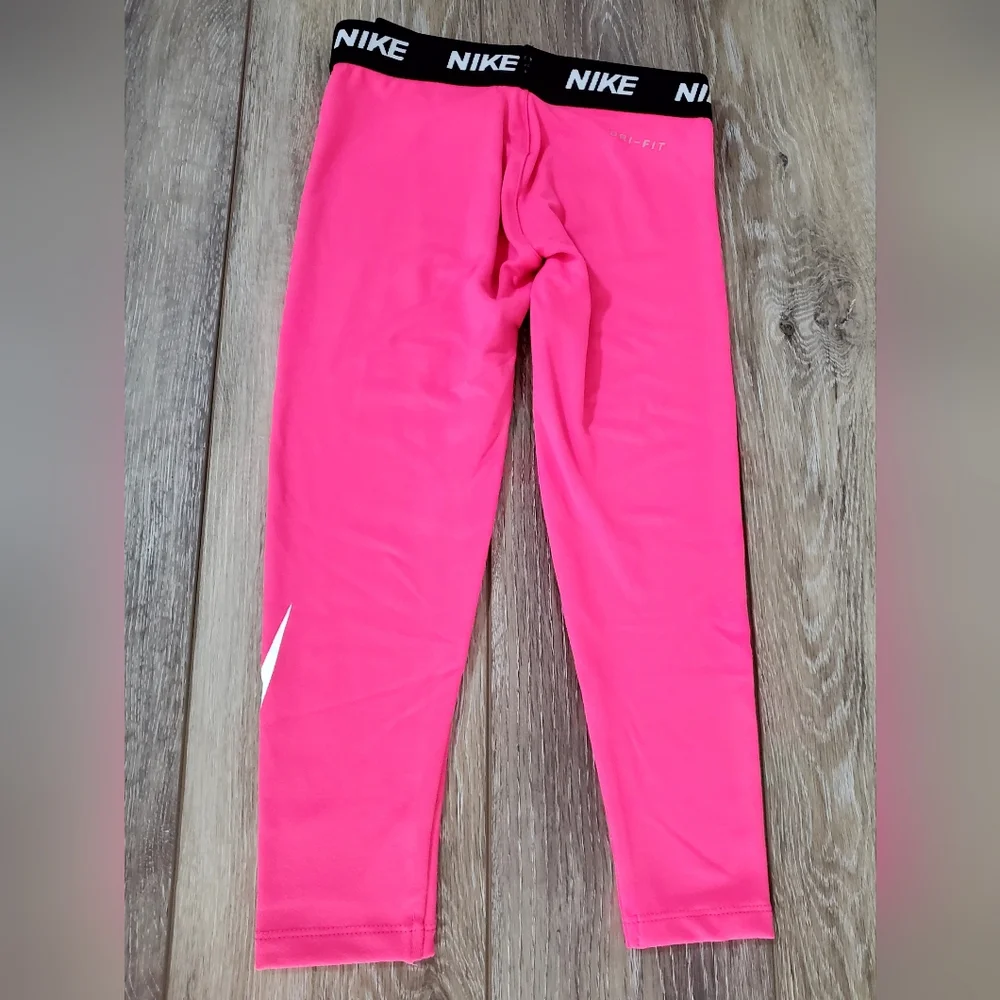 Girl's Nike Hot Pink athletic Leggings, White Swoosh Black Waistband Size 5 Or 6